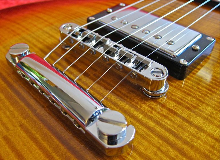 Bass guitar deals bridge types